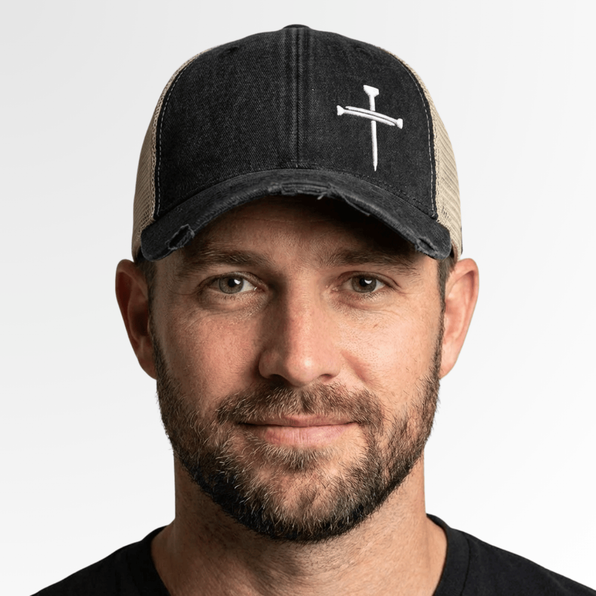 Nail Cross Lower Left Trucker Hats